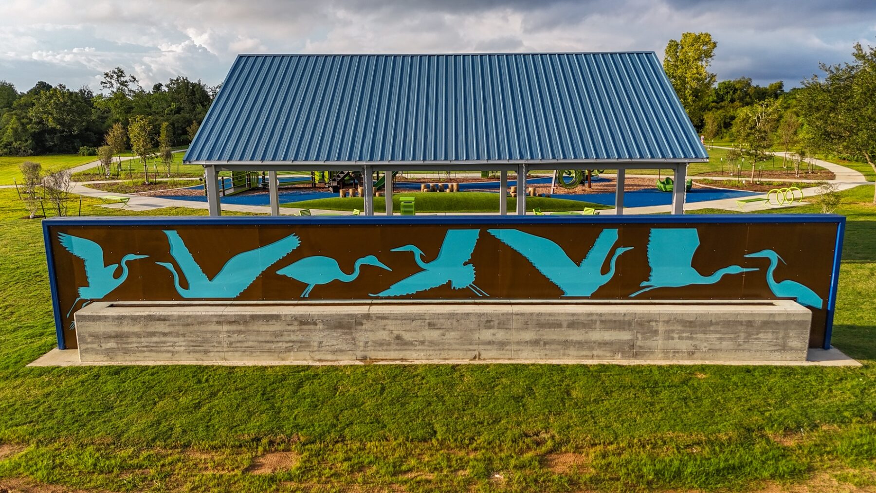 57 Acres Park pavilion with cut-metal heron panel