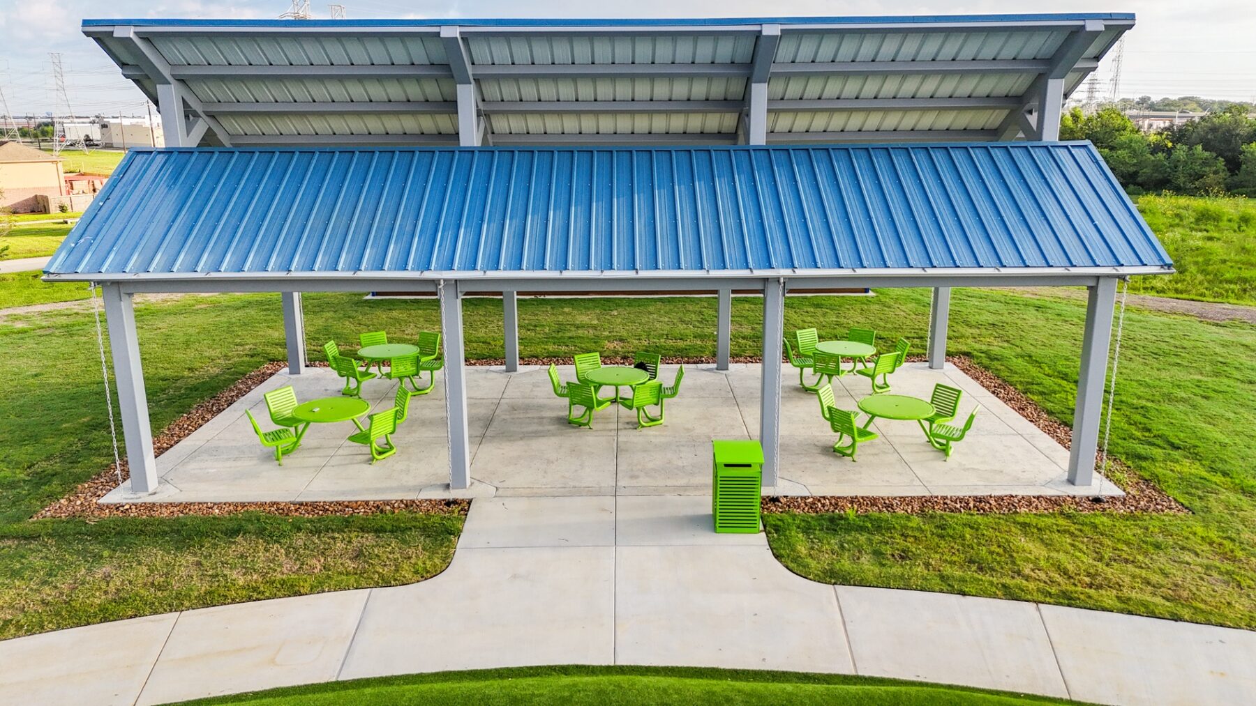 57 Acres Park custom pavilion with two-tier blue metal roof