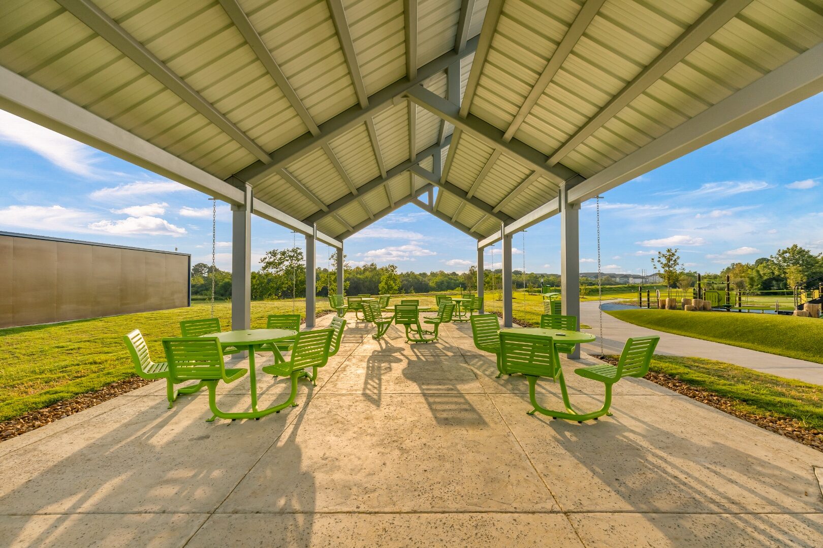 View under the 57 Acres pavilion roof showing the steel structure and clerestory